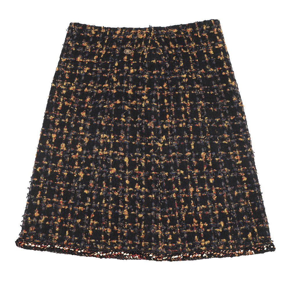 CHANEL Tweed 4-pocket collarless jacket and skirt set with Gripoa buttons Size Jacket36/Skirt38 Black/Yellow/Navy/Bordeaux/GoldP61915V47013 Cotton44% Polyamide31% Silk12% Acetate9% Mohair4%