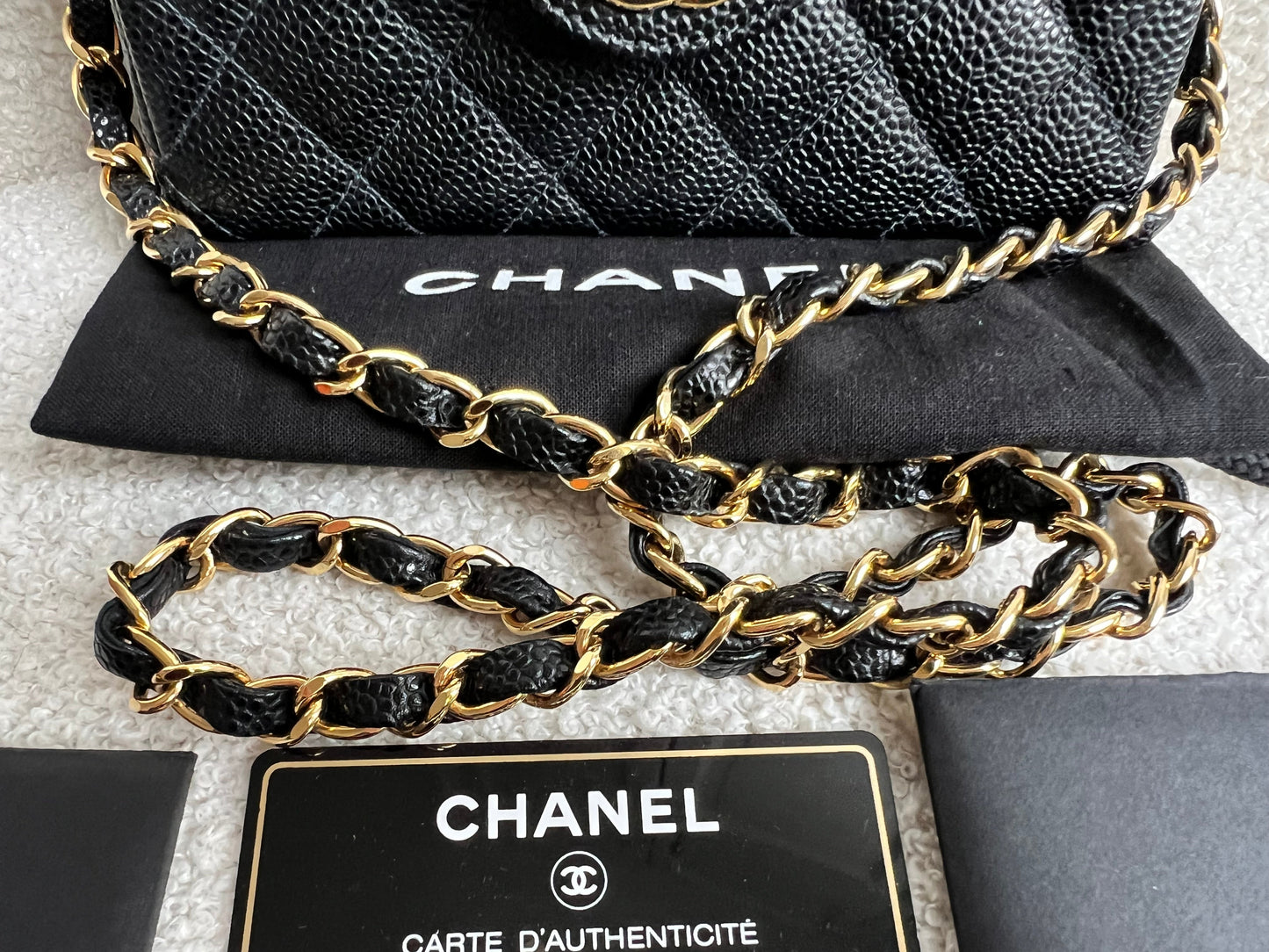 Chanel Square Mini Classic Flap in Black Caviar with gold hardware
