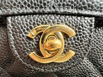 Chanel Square Mini Classic Flap in Black Caviar with gold hardware