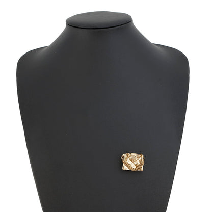 CHANEL Matelasse bag motif brooch Champagne Gold Metal