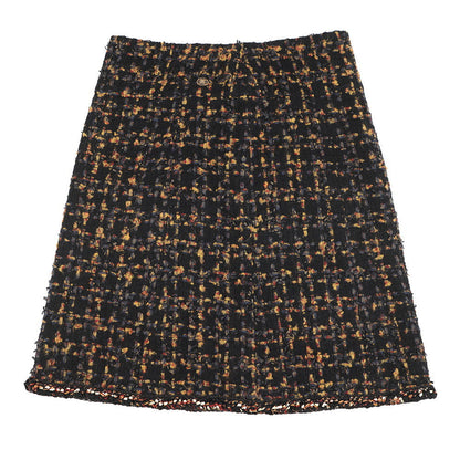 CHANEL Tweed 4-pocket collarless jacket and skirt set with Gripoa buttons Size Jacket36/Skirt38 Black/Yellow/Navy/Bordeaux/GoldP61915V47013 Cotton44% Polyamide31% Silk12% Acetate9% Mohair4%