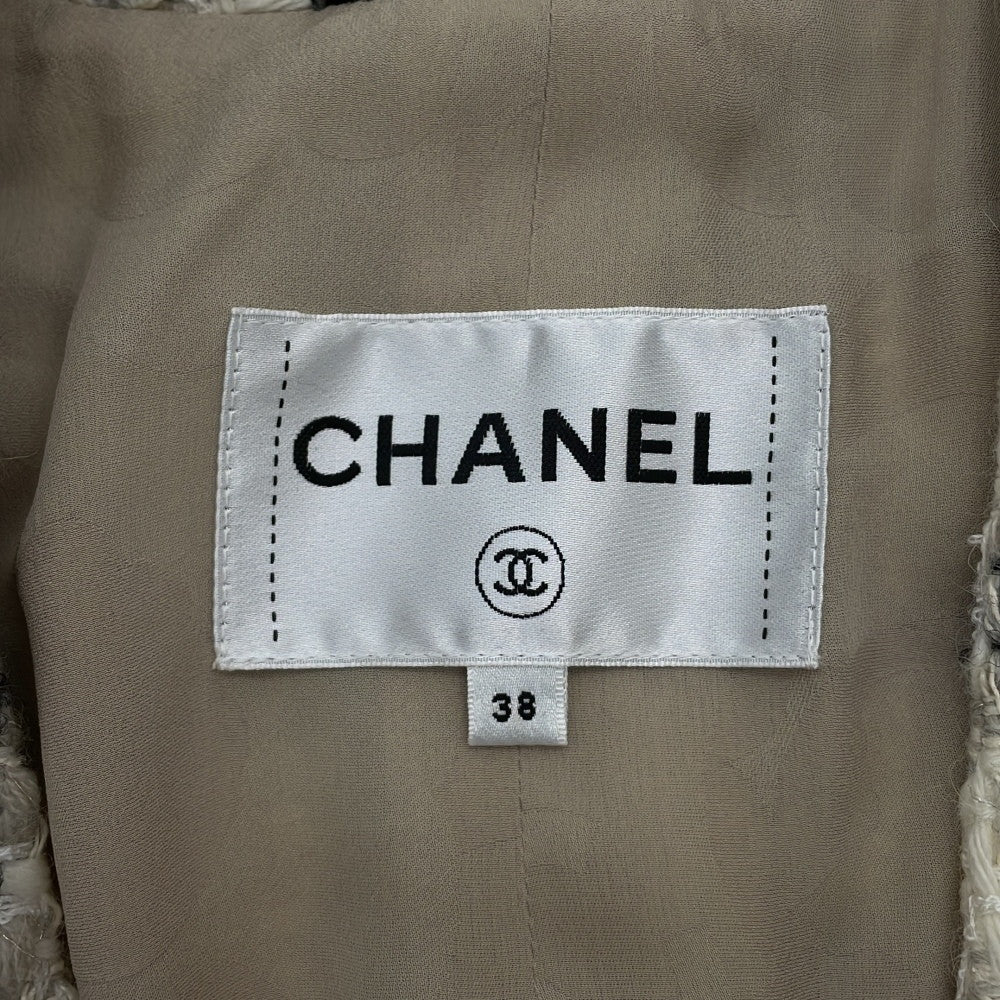 CHANEL Tweed 2-Pocket Collarless Jacket Short Size 38 Ivory/Black/GrayP62411V47773 Wool 38% Acryl23% Polyester18% Linen12% Polyamide7% Alpaca2%