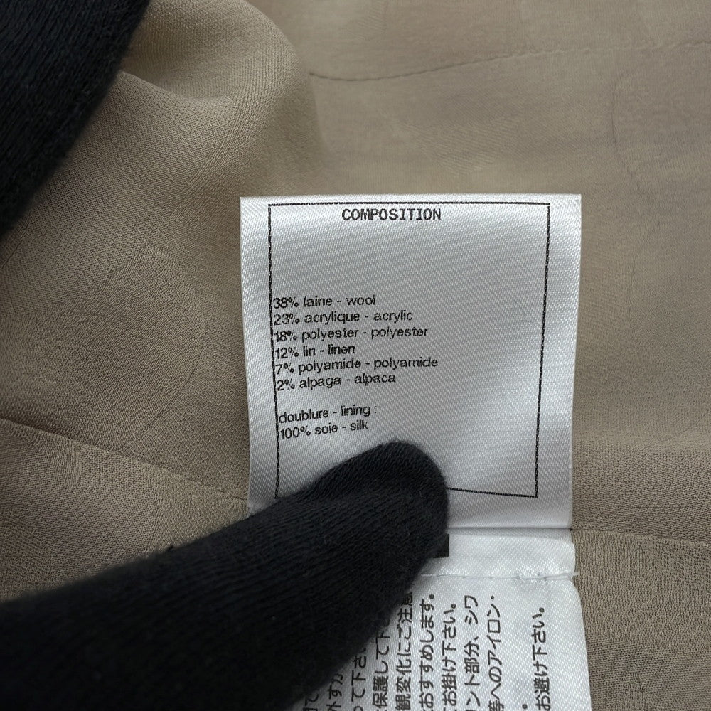 CHANEL Tweed 2-Pocket Collarless Jacket Short Size 38 Ivory/Black/GrayP62411V47773 Wool 38% Acryl23% Polyester18% Linen12% Polyamide7% Alpaca2%