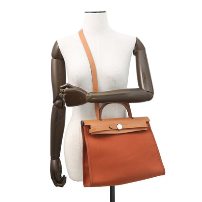 HERMES Herbag zip Orange/Natural Toile H Vache Hunter Leather Size PM