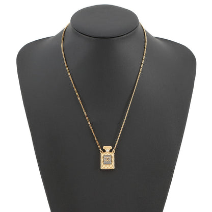 CHANEL CC Logo Perfume Bottle Motif NecklaceAB4392 Gold Plated Rhinestone Faux Pearl