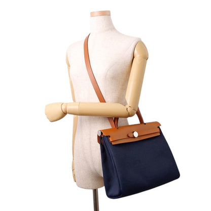 HERMES Herbag zip Navy/Natural Toile H Vache Hunter Leather Size PM
