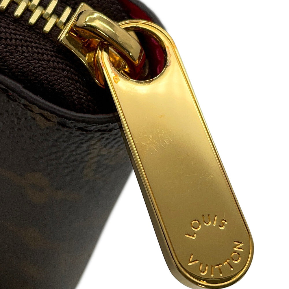 LOUIS VUITTON Zippy Wallet PinkM80857 Monogram/Vivienne Holiday Collection