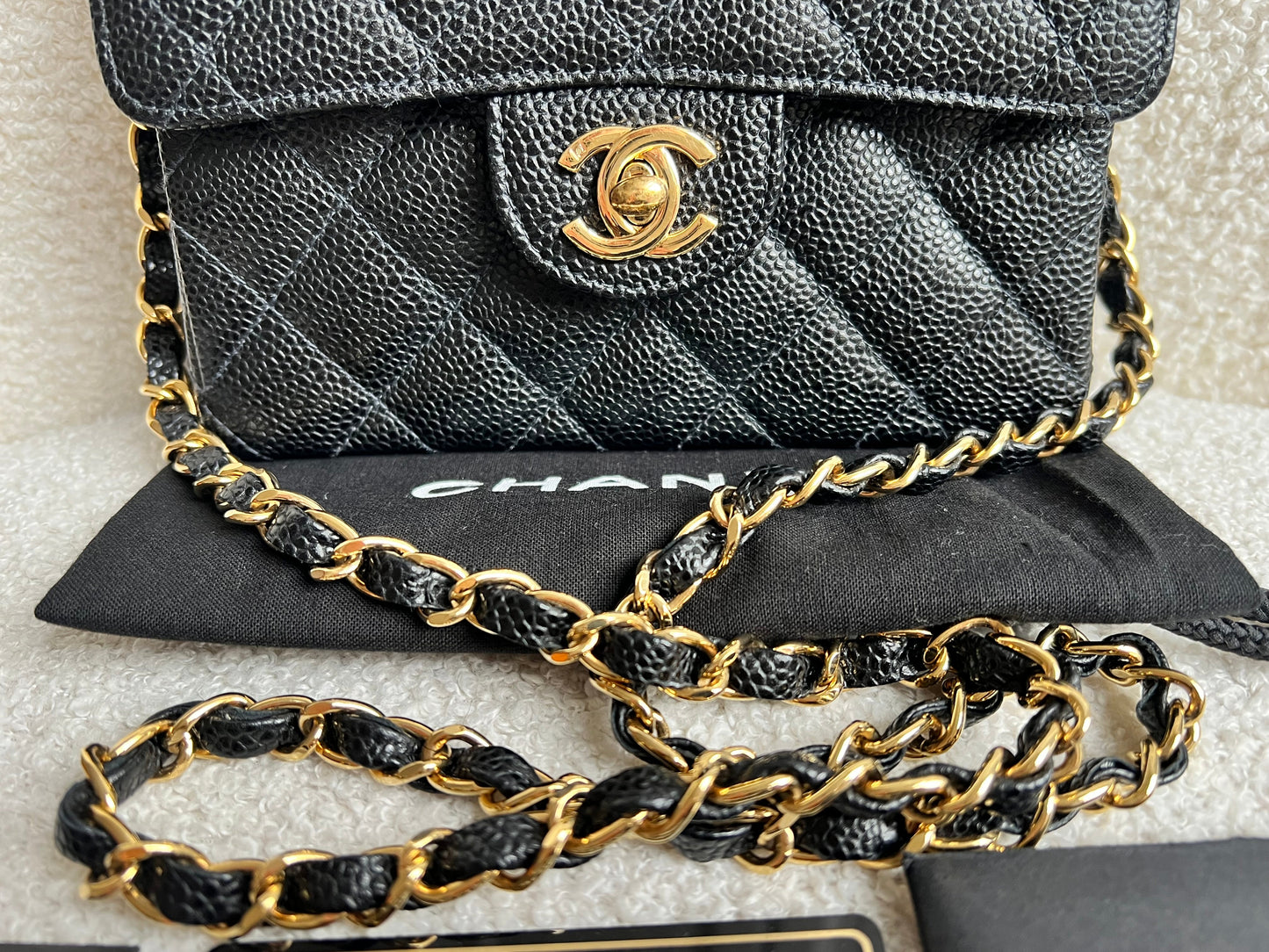 Chanel Square Mini Classic Flap in Black Caviar with gold hardware