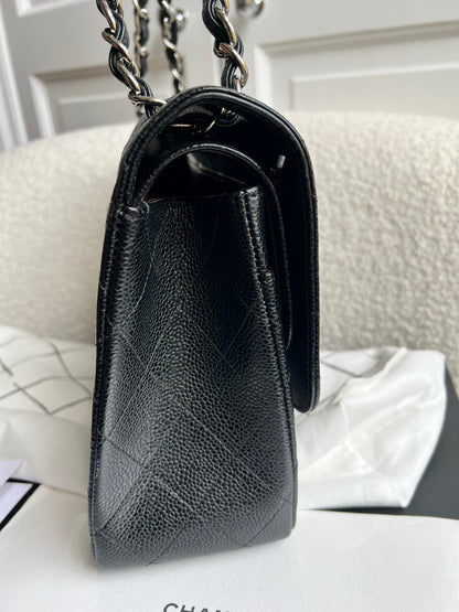 Chanel Jumbo Double Flap in Black Caviar with silver hardware