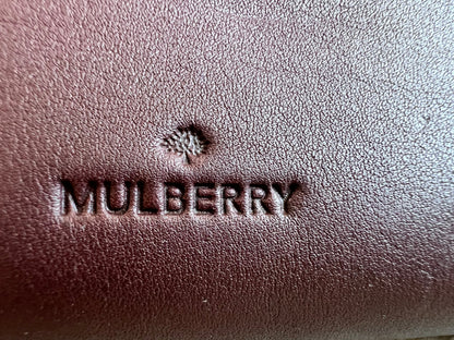 Mulberry Cara 'Lion & Heart Rivets' Zip Around Continental Purse in Oxblood Silky Calf
