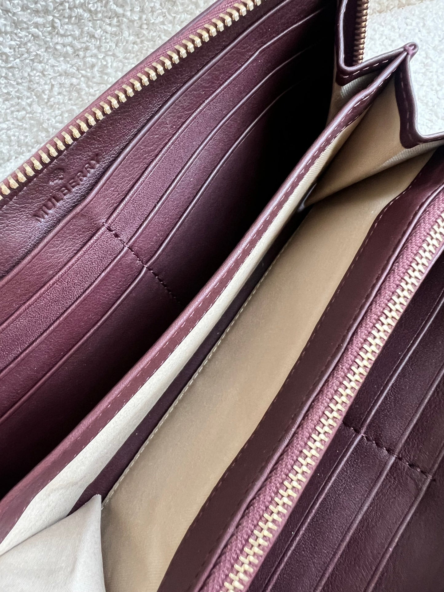 Mulberry Cara 'Lion & Heart Rivets' Zip Around Continental Purse in Oxblood Silky Calf