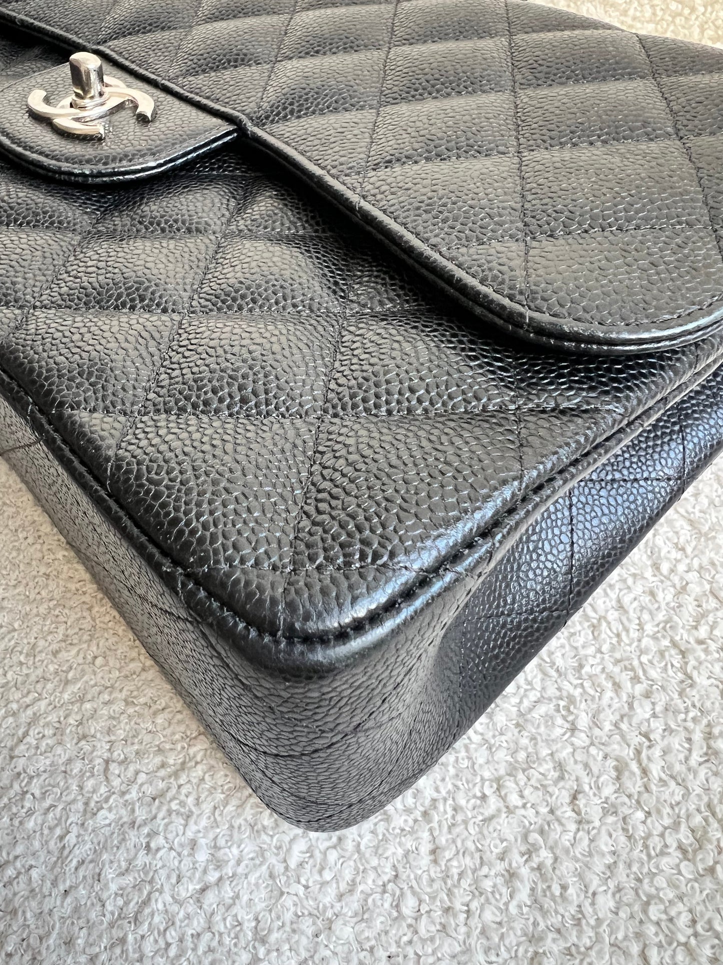 Chanel Jumbo Double Flap in Black Caviar with silver hardware