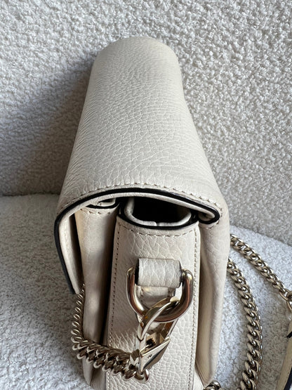 Gucci Interlocking GG Cream Mini Cross Body Bag
