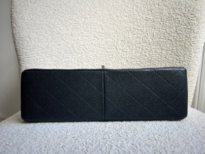 Chanel Jumbo Double Flap in Black Caviar with silver hardware