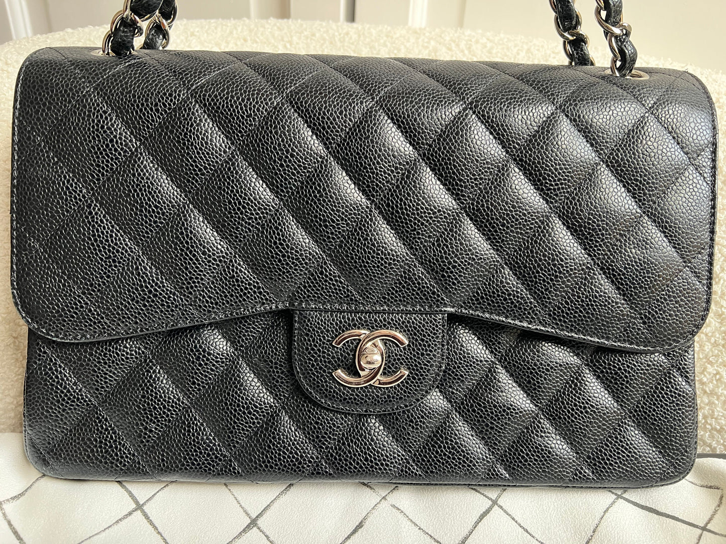 Chanel Jumbo Double Flap in Black Caviar with silver hardware
