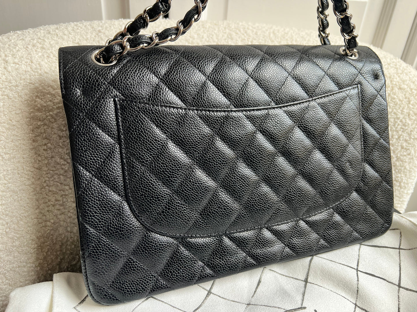 Chanel Jumbo Double Flap in Black Caviar with silver hardware