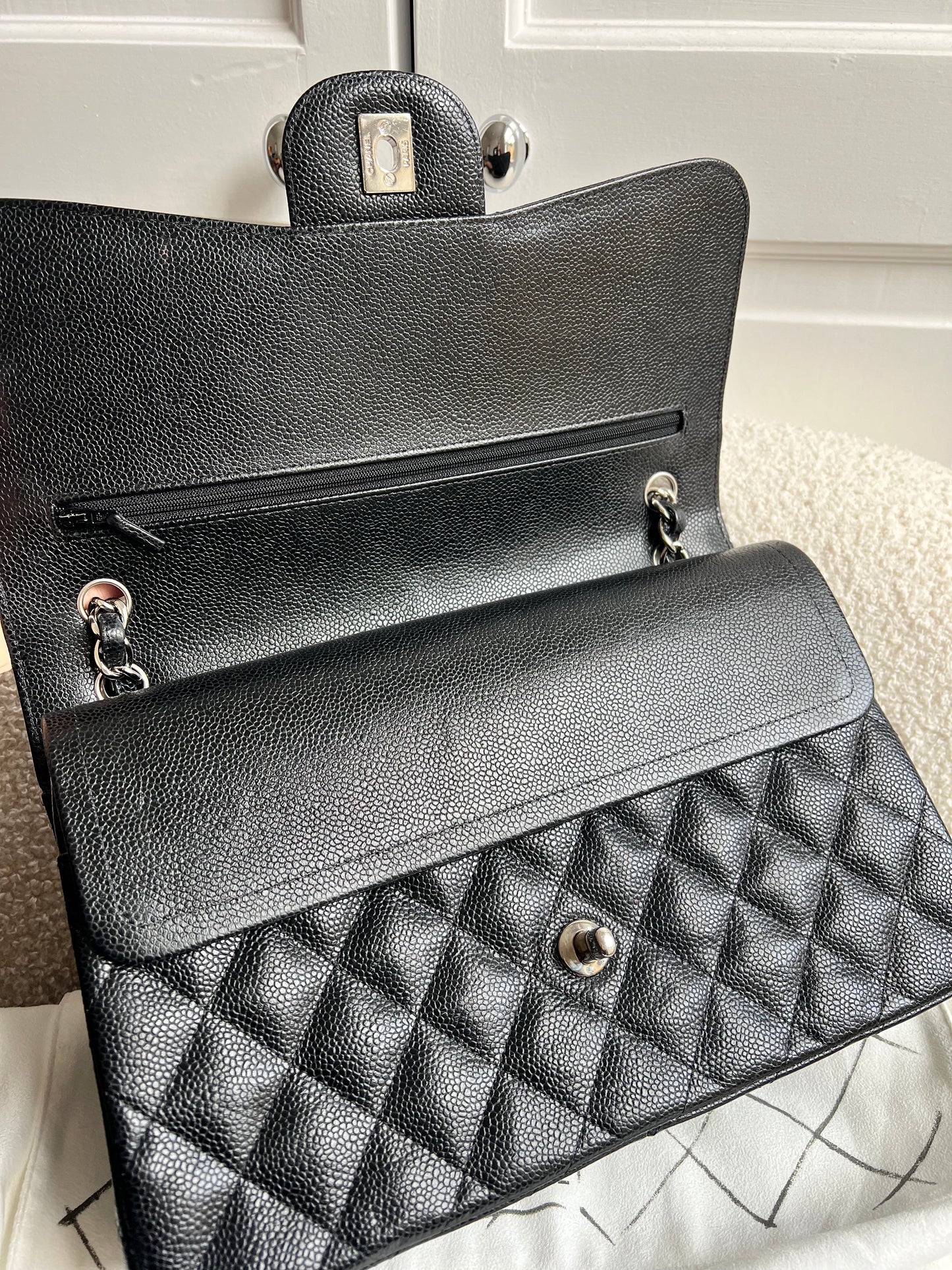 Chanel Jumbo Double Flap in Black Caviar with silver hardware