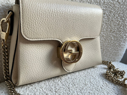 Gucci Interlocking GG Cream Mini Cross Body Bag