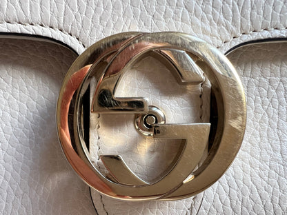 Gucci Interlocking GG Cream Mini Cross Body Bag