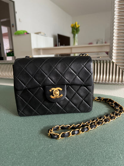 Mini Flap in Black Lambskin