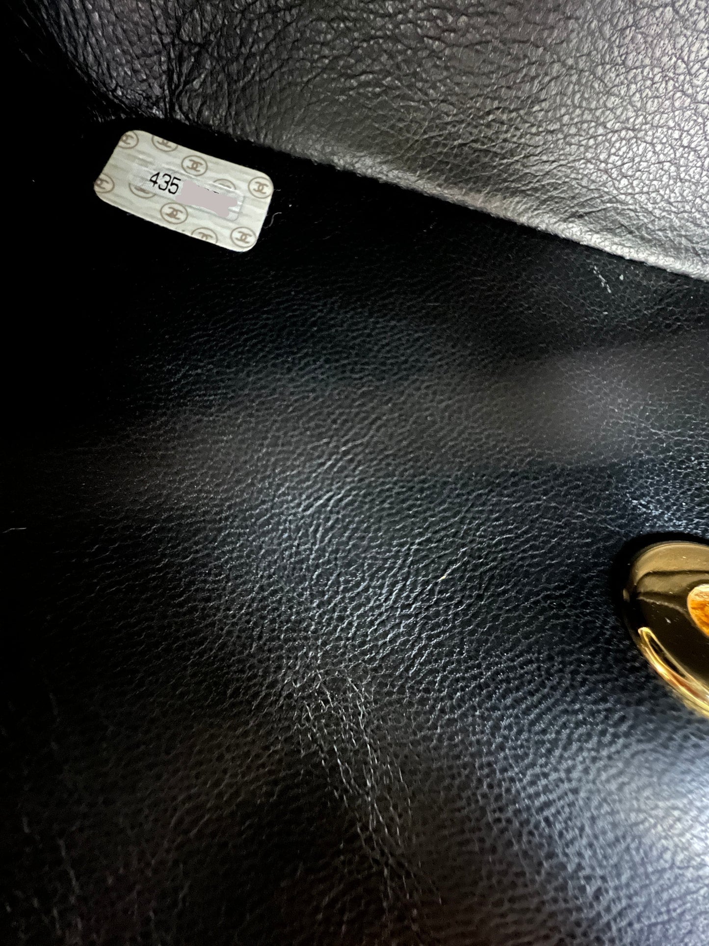 Mini Flap in Black Lambskin