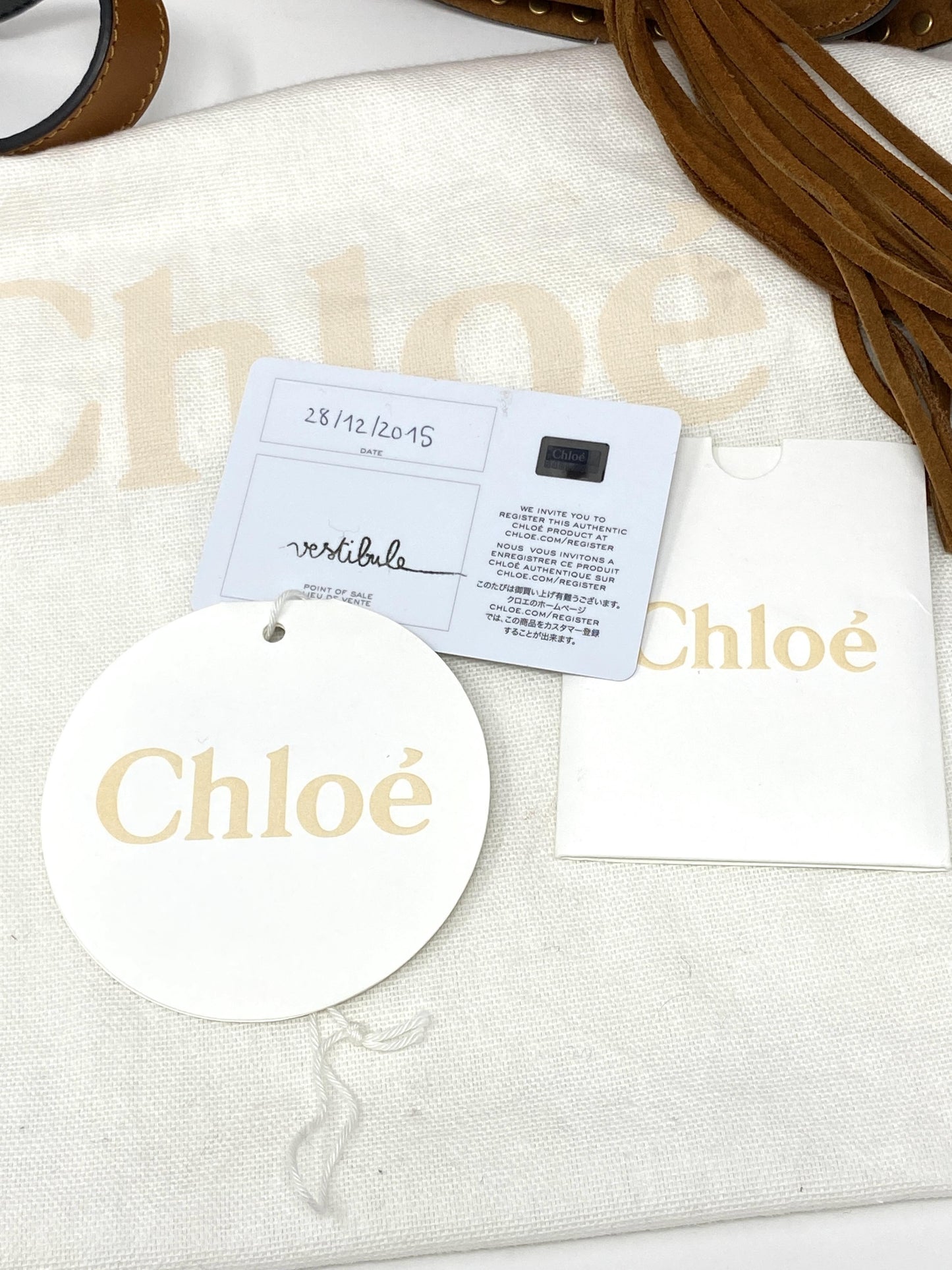 Chloé Hudson mini whipstitched suede shoulder bag in Tan